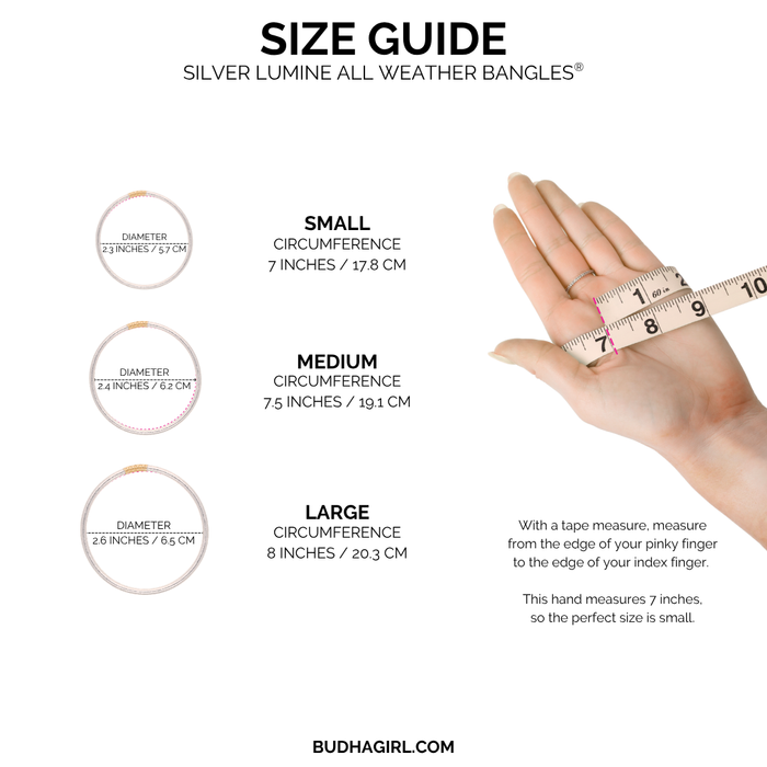a hand measuring a size