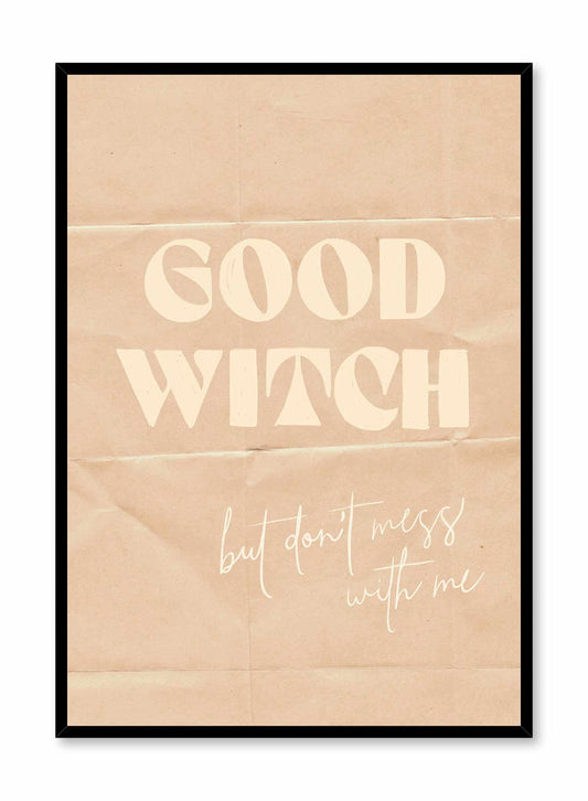 Bewitched is an typography and illustration of the words 'Good Witch' and 'but don't mess with me' on a folded beige paper by Audrey Rivet in collaboration with Opposite Wall.