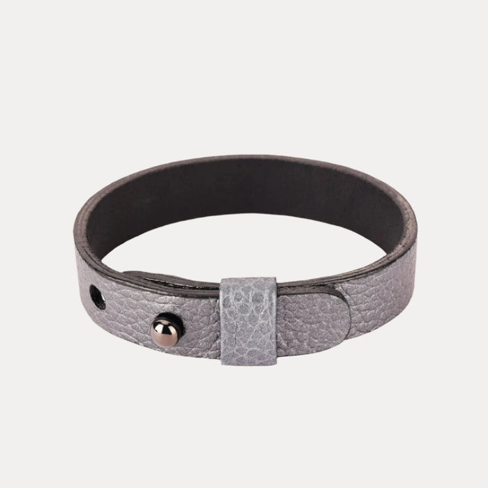 a grey leather bracelet with a metal buckle