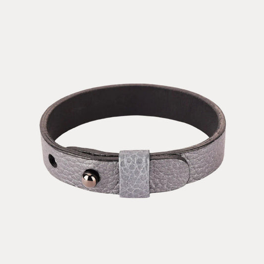 a grey leather bracelet with a metal buckle
