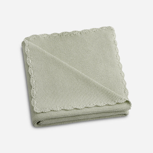 Cotton Knit Blanket in Sage Green with scallop trim detail, folded