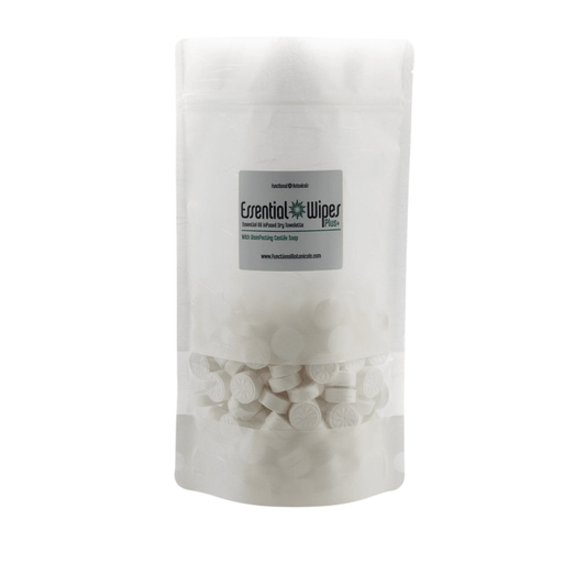 Clear resealable pouch of white round Essential Wipes Plus PRO Pak - 350 qty | Functional Botanicals with visible embossed tabs inside for skincare and wellness use.