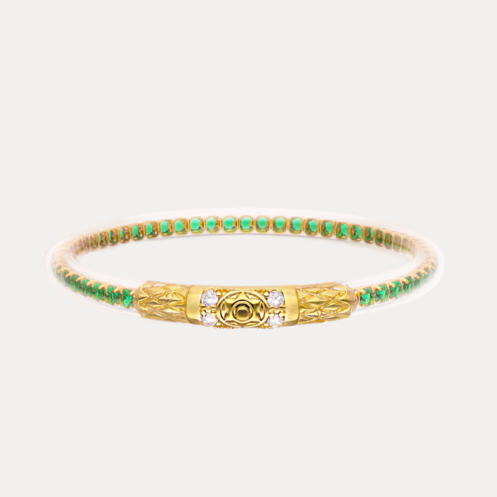 a gold and green bracelet