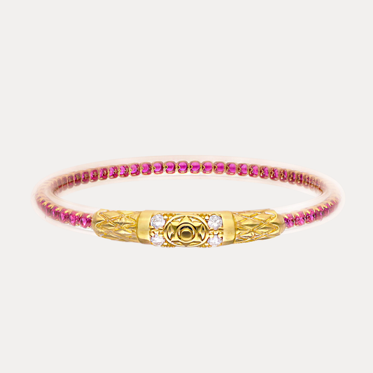 a gold and pink bracelet