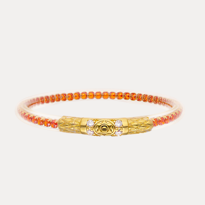 a gold and orange bracelet