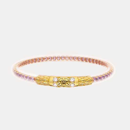 a gold and pink bracelet