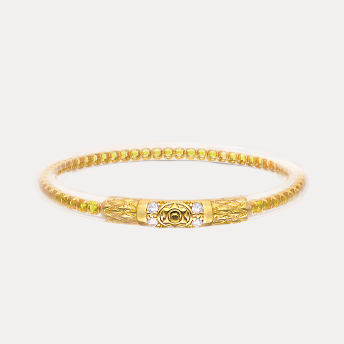 a gold bracelet with a gold band