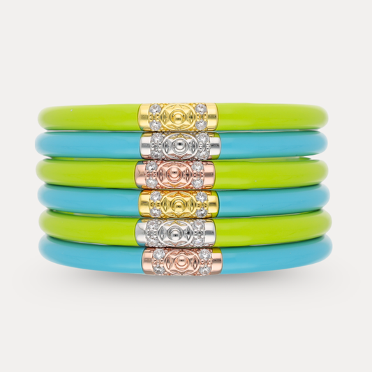 a stack of colorful bracelets